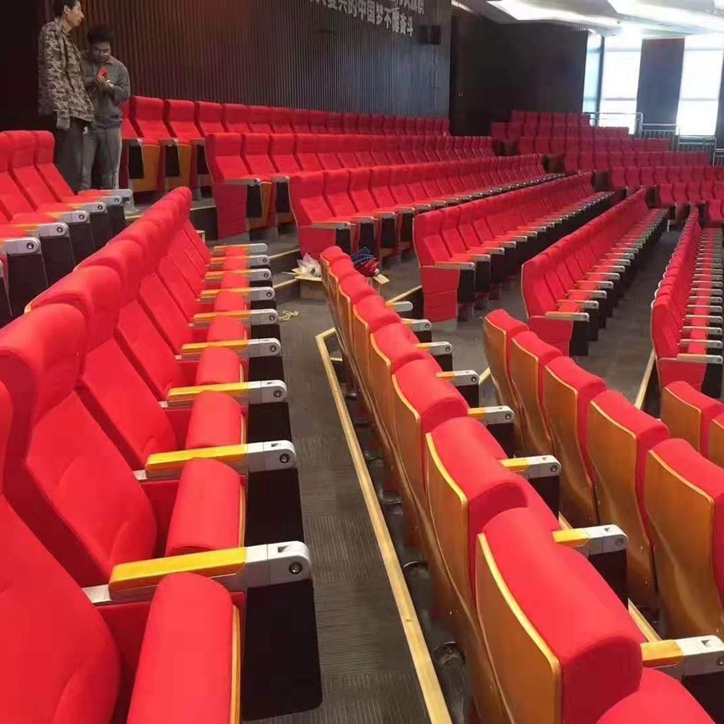 Ghế hội trường bọc đệm có bàn viết, tay vịn ốp gỗ, chân nhôm đúc WH8019-1 Ghế hội trường bọc đệm có bàn viết, tay vịn ốp gỗ, chân nhôm đúc WH8019-1