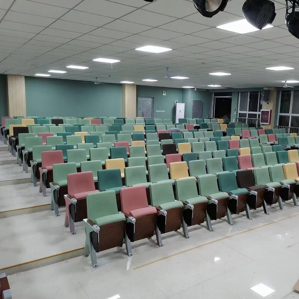 Ghế hội trường bọc nỉ chân nhôm đúc chữ V ngược, kèm bàn viết linh hoạt Ghế hội trường bọc nỉ chân nhôm đúc chữ V ngược, kèm bàn viết linh hoạt
